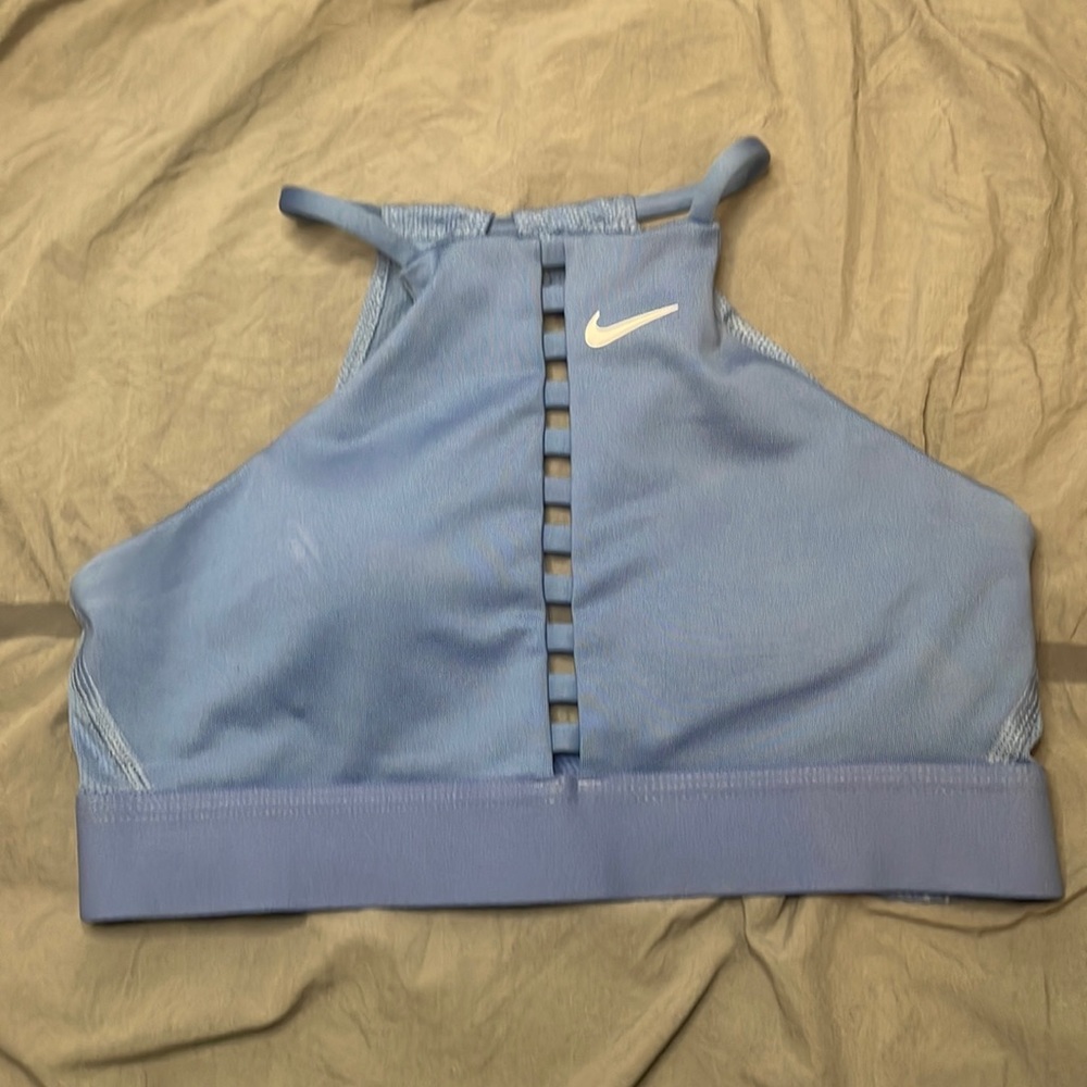 blue nike sports bra with white nike swoosh! size small